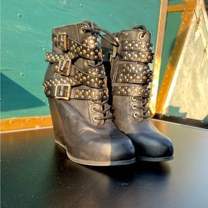 BCBG black leather wedge booties